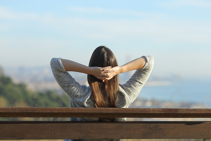 Lady relaxing in open air