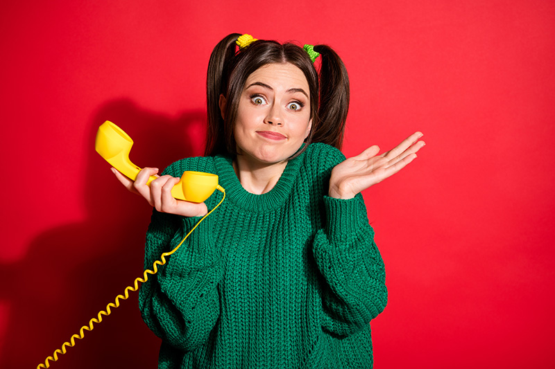 Lady holding a handset