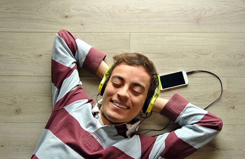 Man listening to music from his mobile phone